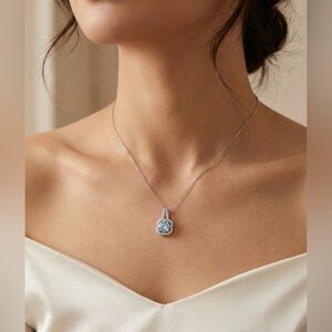 NWT 2.0CT (8mm) Light Blue Halo Moissanite Necklace, in .925 Sterling Silver.